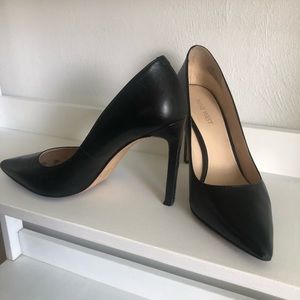 Black pointed toe stilettos